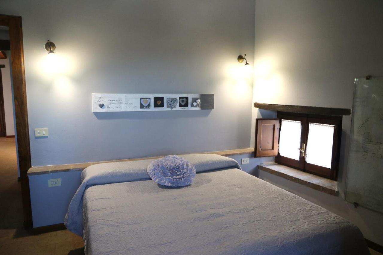 Corte Fratini Appartamenti Trevi Exterior foto